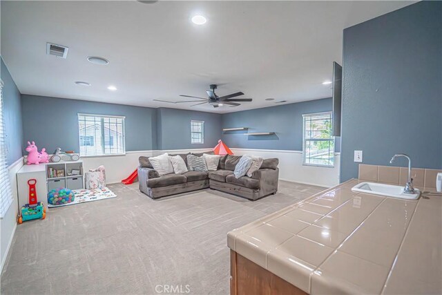 28217 Alton Way, Castaic, CA 91384 - carpeted living room featuring a sink, plenty of natural light, a ceiling fan, and recessed lighting