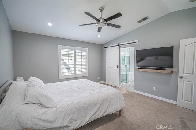 28217 Alton Way, Castaic, CA 91384 - bedroom with lofted ceiling, multiple windows, a barn door, baseboards, and carpet flooring