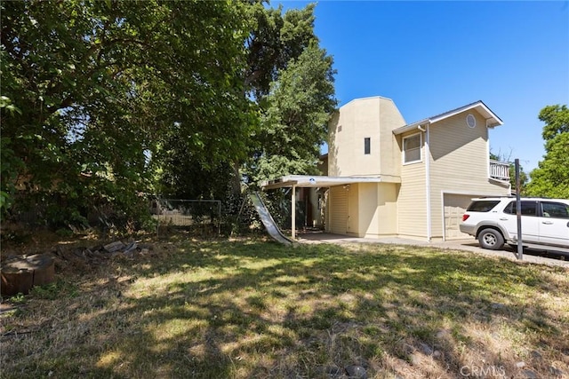 2631 San Jose St, Chico, CA 95973 - view of yard featuring a garage
