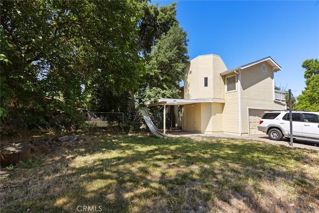 2631 San Jose St, Chico, CA 95973 - view of yard featuring a garage