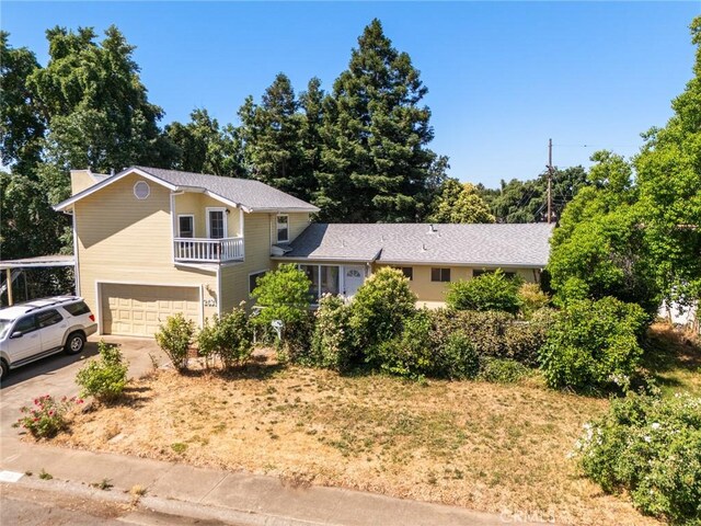 2631 San Jose St, Chico, CA 95973 - view of front of property with a garage and driveway