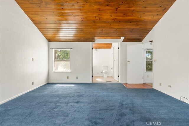 2631 San Jose St, Chico, CA 95973 - carpeted empty room featuring wooden ceiling, vaulted ceiling, healthy amount of natural light, and baseboards
