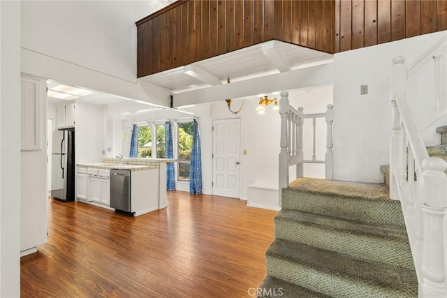 2631 San Jose St, Chico, CA 95973 - kitchen featuring dishwasher, freestanding refrigerator, light countertops, dark wood-style floors, and beamed ceiling