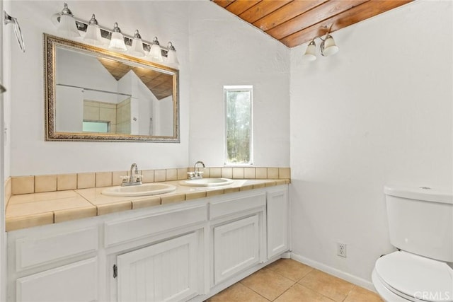 2631 San Jose St, Chico, CA 95973 - bathroom featuring vaulted ceiling, double vanity, tile patterned floors, and wooden ceiling