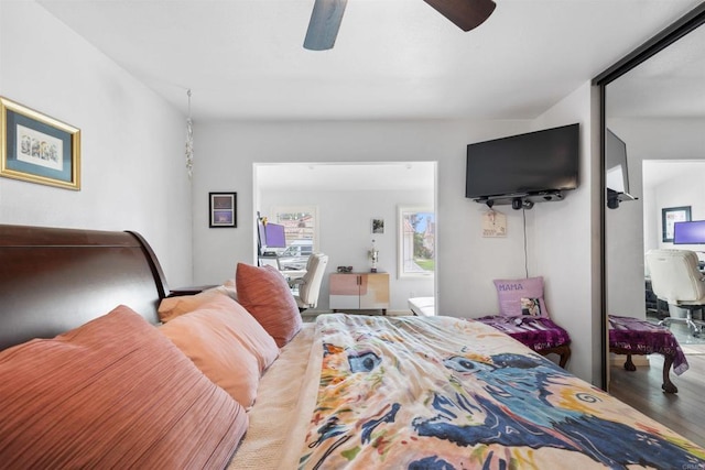 6544 Camino Del Parque, Carlsbad, CA 92011 - bedroom featuring wood finished floors, an office area, and ceiling fan