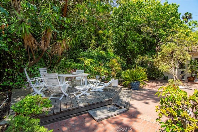 2363 Coldwater Canyon Dr, Beverly Hills, CA 90210 - view of patio featuring outdoor dining area and a deck