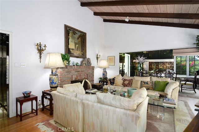 2363 Coldwater Canyon Dr, Beverly Hills, CA 90210 - living room featuring wood ceiling with exposed beams, high vaulted ceiling, wood finished floors, and a fireplace
