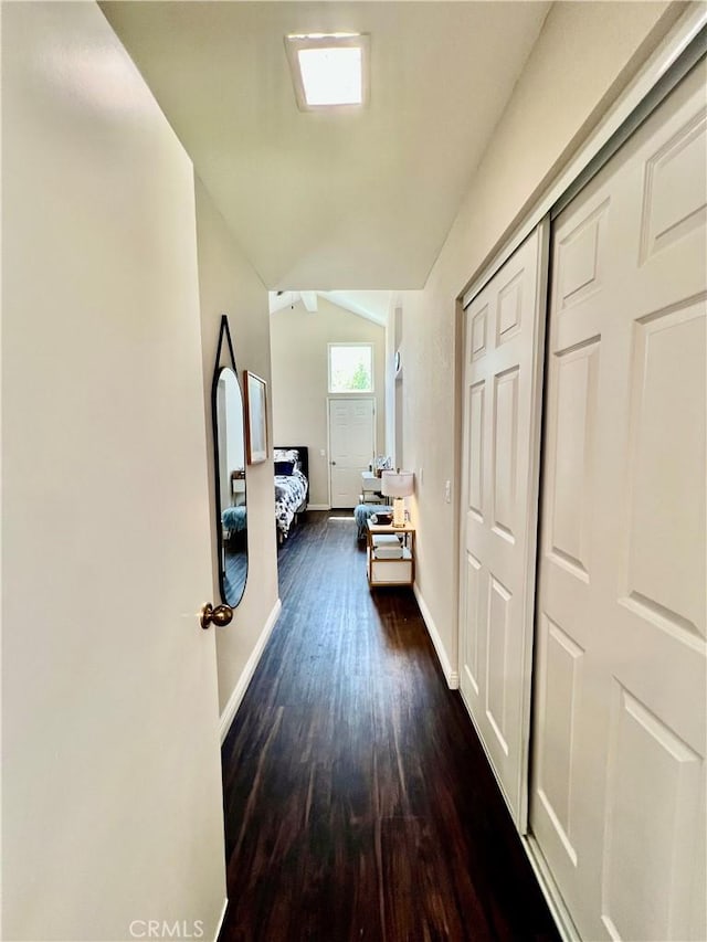 29403 Clear View Ln, Highland, CA 92346 - hallway with baseboards, wood finished floors, and lofted ceiling