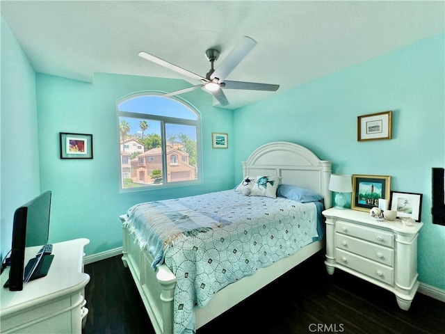 29403 Clear View Ln, Highland, CA 92346 - bedroom with baseboards, dark wood-type flooring, and a ceiling fan