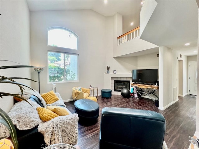 29403 Clear View Ln, Highland, CA 92346 - living room with baseboards, wood finished floors, a tile fireplace, high vaulted ceiling, and recessed lighting