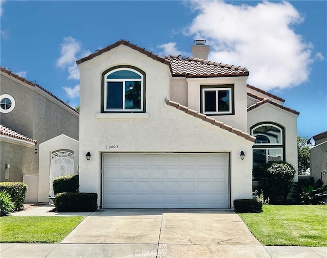 29403 Clear View Ln, Highland, CA 92346 - mediterranean / spanish house featuring a chimney, a tile roof, stucco siding, concrete driveway, and a garage