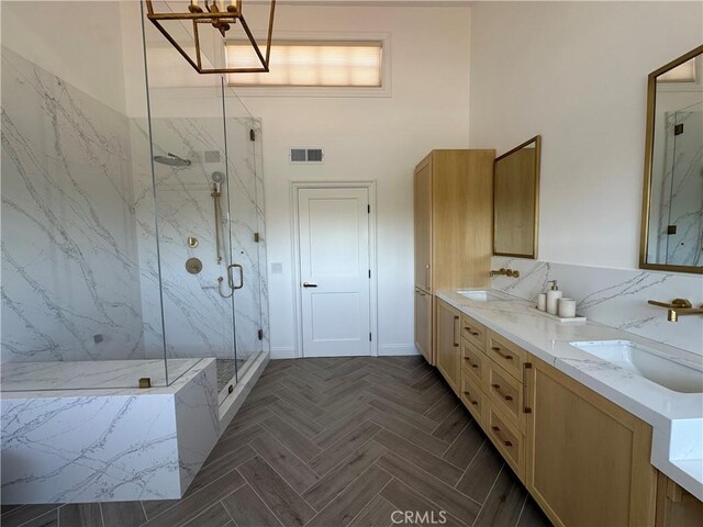 23128 Park Sorrento, Calabasas, CA 91302 - full bath featuring a marble finish shower, double vanity, and a chandelier