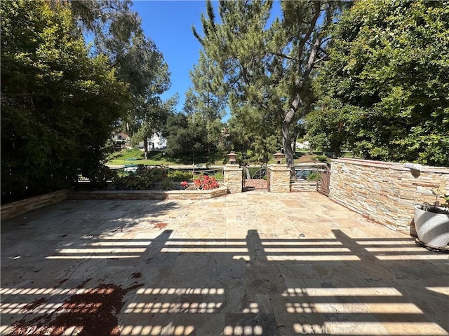 23128 Park Sorrento, Calabasas, CA 91302 - view of patio with a gate
