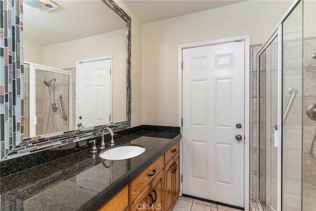 11829 Balboa Blvd, Granada Hills, CA 91344 - bathroom with a shower stall, vanity, and tile patterned floors