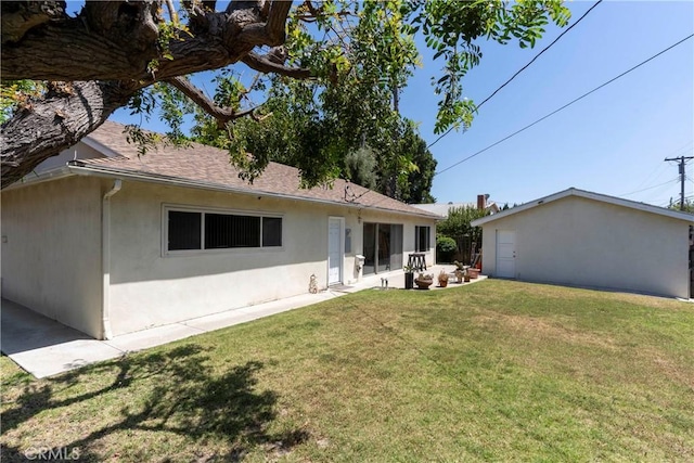 11829 Balboa Blvd, Granada Hills, CA 91344 - rear view of house featuring a yard, stucco siding, and a patio area