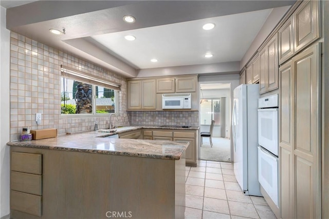 11829 Balboa Blvd, Granada Hills, CA 91344 - kitchen featuring white appliances, a sink, a peninsula, light tile patterned flooring, and light stone countertops