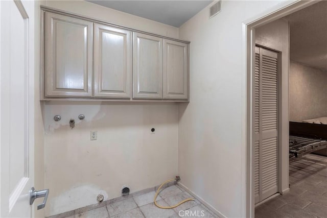 11829 Balboa Blvd, Granada Hills, CA 91344 - washroom with cabinet space, hookup for an electric dryer, gas dryer hookup, baseboards, and tile patterned flooring