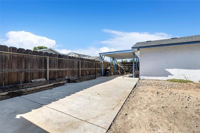 2192 Beverly Ave, Clovis, CA 93611 - fenced backyard with a patio area