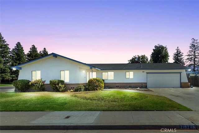 2192 Beverly Ave, Clovis, CA 93611 - ranch-style home featuring a garage, a yard, concrete driveway, and brick siding