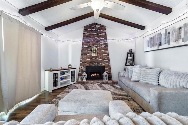 2192 Beverly Ave, Clovis, CA 93611 - living area featuring wood finished floors, a ceiling fan, and a fireplace