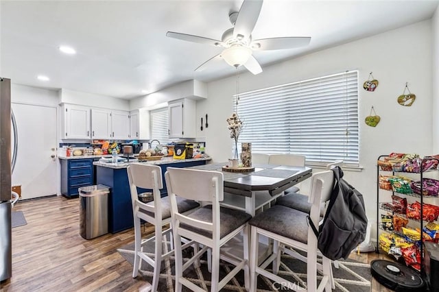 2192 Beverly Ave, Clovis, CA 93611 - dining room with light wood finished floors, a ceiling fan, and recessed lighting