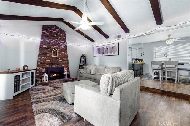 2192 Beverly Ave, Clovis, CA 93611 - living area with a ceiling fan, dark wood-style floors, and a brick fireplace