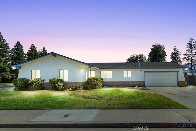 2192 Beverly Ave, Clovis, CA 93611 - ranch-style house with a garage, a yard, concrete driveway, and brick siding