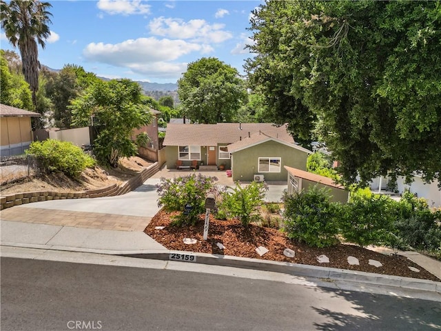 25159 Wheeler Rd, Newhall, CA 91321 - view of front of property featuring stucco siding and concrete driveway