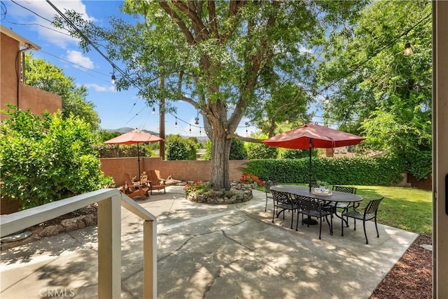 25159 Wheeler Rd, Newhall, CA 91321 - fenced backyard featuring outdoor dining area and a patio