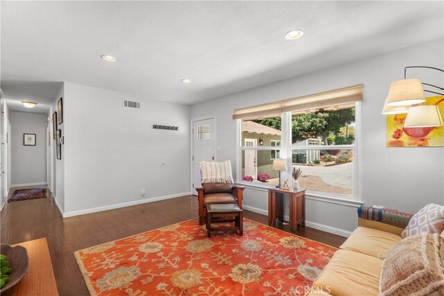 25159 Wheeler Rd, Newhall, CA 91321 - living area featuring wood finished floors, recessed lighting, and baseboards
