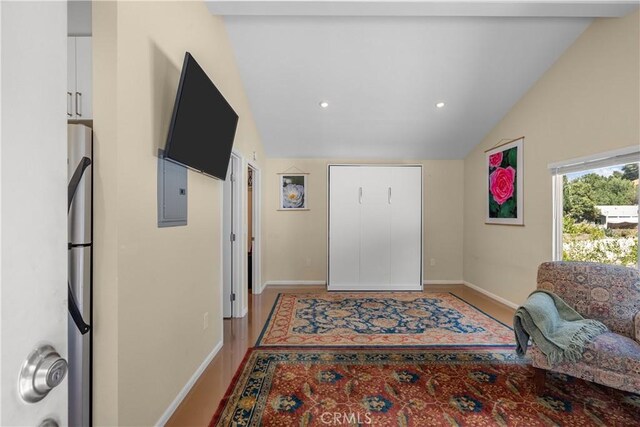 25159 Wheeler Rd, Newhall, CA 91321 - entryway with lofted ceiling, baseboards, electric panel, light wood-type flooring, and recessed lighting