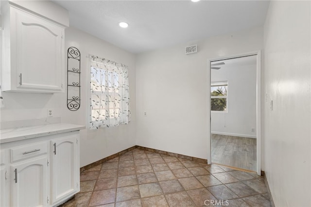 11422 Charlesworth Rd, Santa Fe Springs, CA 90670 - unfurnished dining area featuring baseboards and recessed lighting