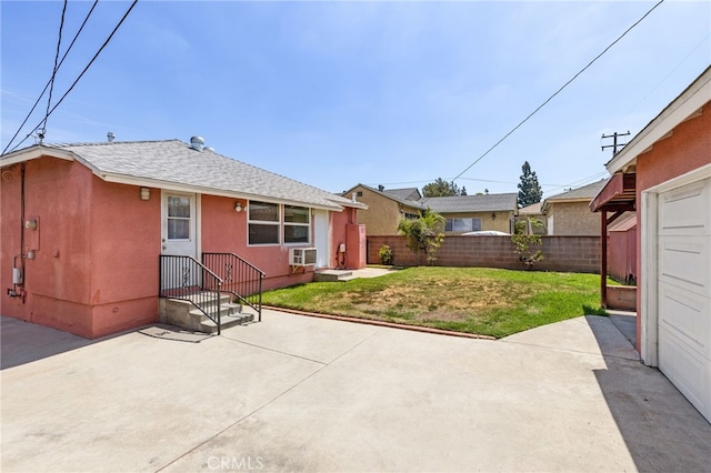 11422 Charlesworth Rd, Santa Fe Springs, CA 90670 - rear view of property with a patio, roof with shingles, stucco siding, and cooling unit