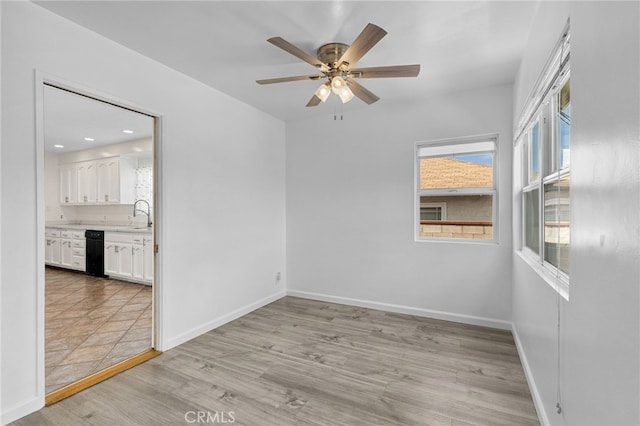11422 Charlesworth Rd, Santa Fe Springs, CA 90670 - spare room with light wood-style floors, baseboards, a ceiling fan, and recessed lighting