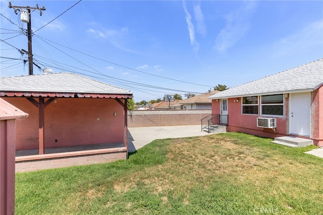 11422 Charlesworth Rd, Santa Fe Springs, CA 90670 - view of yard with a wall unit AC and a patio area