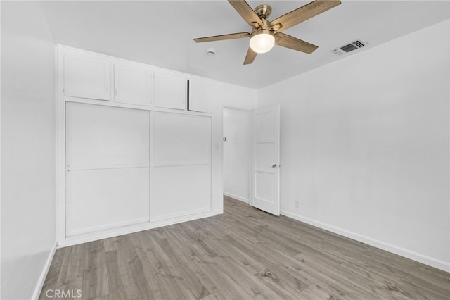 11422 Charlesworth Rd, Santa Fe Springs, CA 90670 - unfurnished bedroom with light wood-type flooring, baseboards, a closet, and a ceiling fan