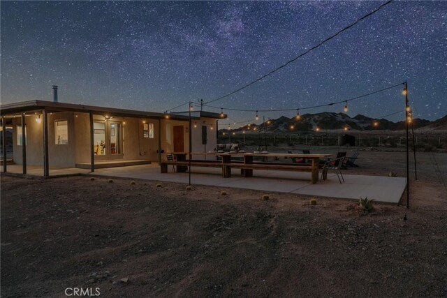 79124 Valle Vista Rd Unit 29, Palms, CA 92277 - rear view of property featuring a patio