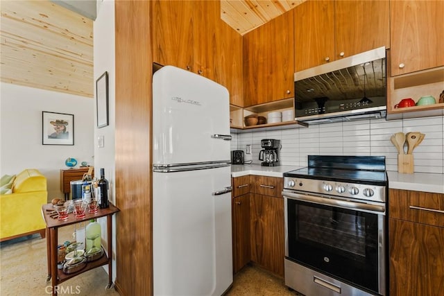79124 Valle Vista Rd Unit 29, Palms, CA 92277 - kitchen with appliances with stainless steel finishes, light countertops, open shelves, wooden ceiling, and decorative backsplash