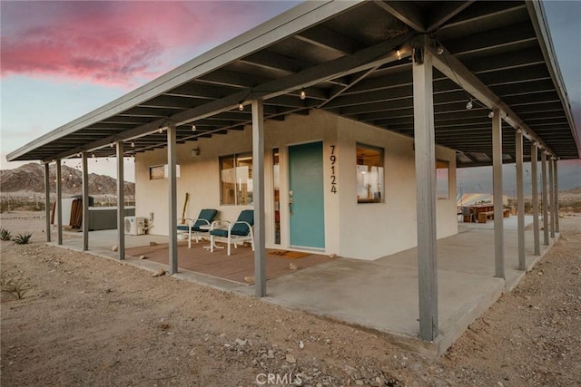 79124 Valle Vista Rd Unit 29, Palms, CA 92277 - patio terrace at dusk with a patio area