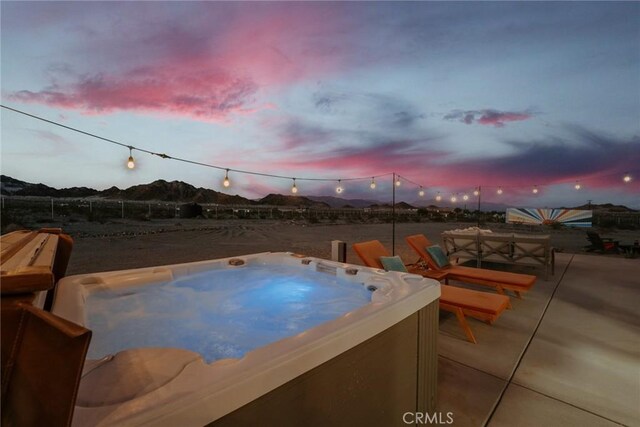 79124 Valle Vista Rd Unit 29, Palms, CA 92277 - view of patio featuring a hot tub