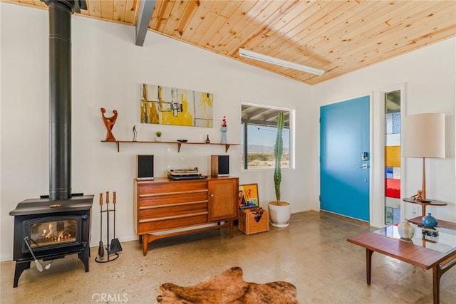 79124 Valle Vista Rd Unit 29, Palms, CA 92277 - sitting room with a wood stove, wooden ceiling, and lofted ceiling