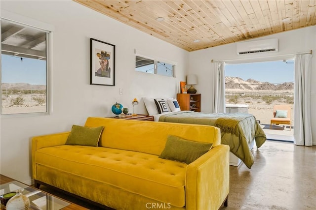 79124 Valle Vista Rd Unit 29, Palms, CA 92277 - bedroom featuring an AC wall unit, a mountain view, multiple windows, wooden ceiling, and finished concrete flooring