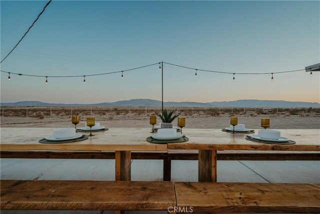 79124 Valle Vista Rd Unit 29, Palms, CA 92277 - yard at dusk with a mountain view