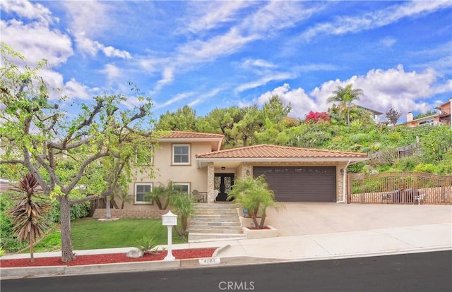 4784 Browndeer Ln, Rancho Palos Verdes, CA 90275 - mediterranean / spanish home featuring a tiled roof, a garage, concrete driveway, and stucco siding