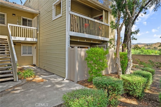 23478 Cambridge Rd Unit 296, Yorba Linda, CA 92887 - view of building exterior with stairway and a mountain view