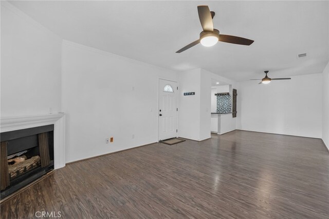 23478 Cambridge Rd Unit 296, Yorba Linda, CA 92887 - unfurnished living room featuring ceiling fan, a fireplace, and wood finished floors