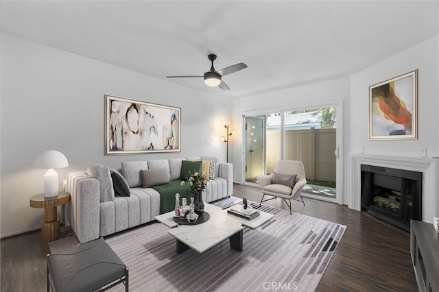23478 Cambridge Rd Unit 296, Yorba Linda, CA 92887 - living room featuring a ceiling fan, dark wood-style flooring, and a fireplace
