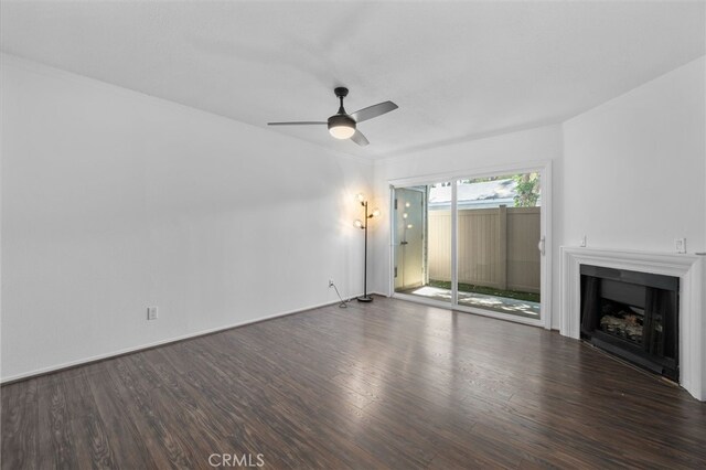 23478 Cambridge Rd Unit 296, Yorba Linda, CA 92887 - unfurnished living room with wood finished floors, ceiling fan, and a fireplace