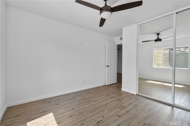 23478 Cambridge Rd Unit 296, Yorba Linda, CA 92887 - unfurnished bedroom with a closet, wood finished floors, baseboards, and ceiling fan