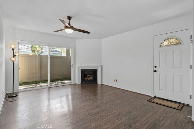 23478 Cambridge Rd Unit 296, Yorba Linda, CA 92887 - unfurnished living room with a fireplace, a ceiling fan, wood finished floors, and ornamental molding